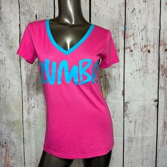 ZUMBA FITNESS women’s V-Neck Tee in Berry (Pink) “Join The Party” Large NWT - Picture 1 of 10